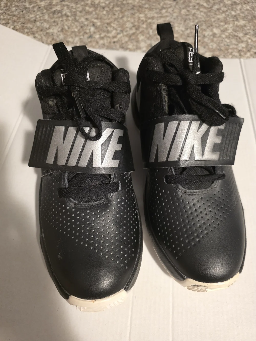 Nike Team Hustle Sneakers